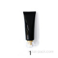 Zwarte plastic fles aangepaste lege roomlotionbuis